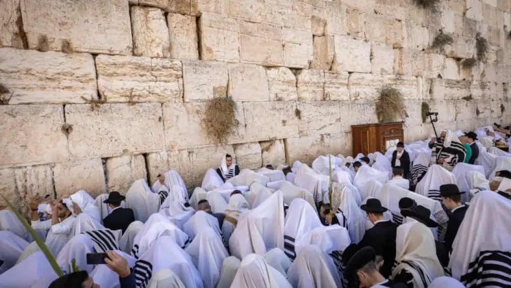 Jews pray at the Western Wall in Jerusalem during Sukkot, Oct. 12, 2022. Photo by Olivier Fitoussi/Flash90.