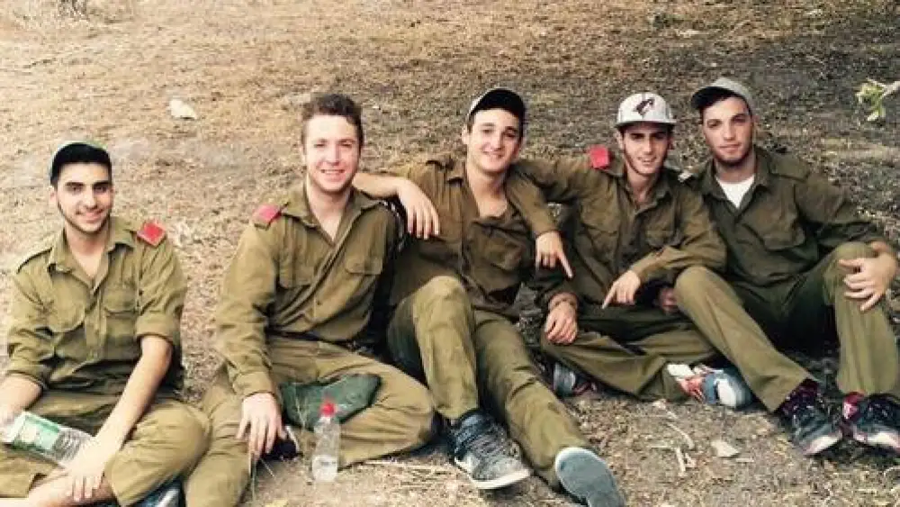 Click photo to download. Caption: Pictured in center is the late Ezra Schwartz, an American yeshiva student killed by a Palestinian terror attack on Nov. 19. Credit: Facebook.