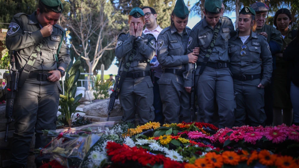 Click photo to download. Caption: Friends and relatives attend the funeral of slain Israeli Border Police officer Hadar Cohen, 19, at the cemetery in Yehud in central Israel on Feb. 4. Credit: Yonatan Sindel/Flash90.