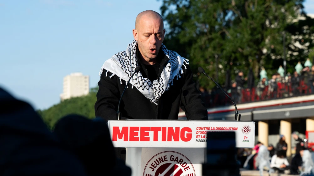 French-Palestinian terrorist Salah Hamouri addresses a protest at the Place Stalingrad square in Paris, May 6, 2025. Photo by Leo Vignal/AFP via Getty Images.