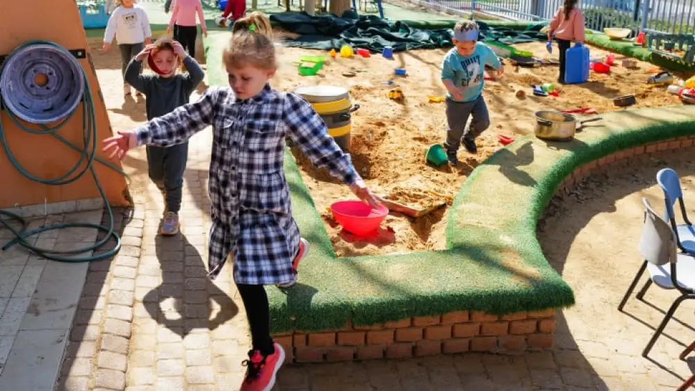 Staff and kids take part in a missile attack drill during a national IDF Home Front Command drill at Batra Kindergarten in Katzrin, the Golan Heights, Feb. 22, 2023. Photo by Michael Giladi/Flash90.