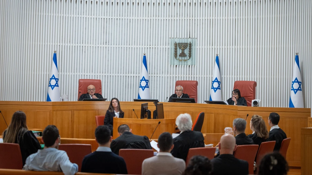 Supreme court justice Ofer Grosskopf arrives for a court hearing on a petition to convene the Judicial Selection Committee at the Supreme Court in Jerusalem, Feb. 12, 2026. Photo by Chaim Goldberg/Flash90.