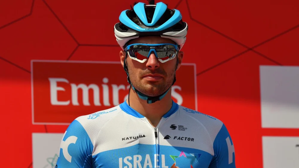 The French-born Rudy Barbier, who competes on the “Israel Start-Up Nation” cycling team, poses after finishing third in the UAE Tour on Sunday. Source: “Israel Start-Up Nation” via Twitter.