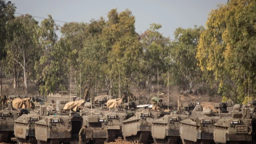 Israeli armored vehicles at a staging area in southern Israel near the border with the Gaza Strip on Nov. 13, 2019. Photo by Yonatan Sindel/Flash90.