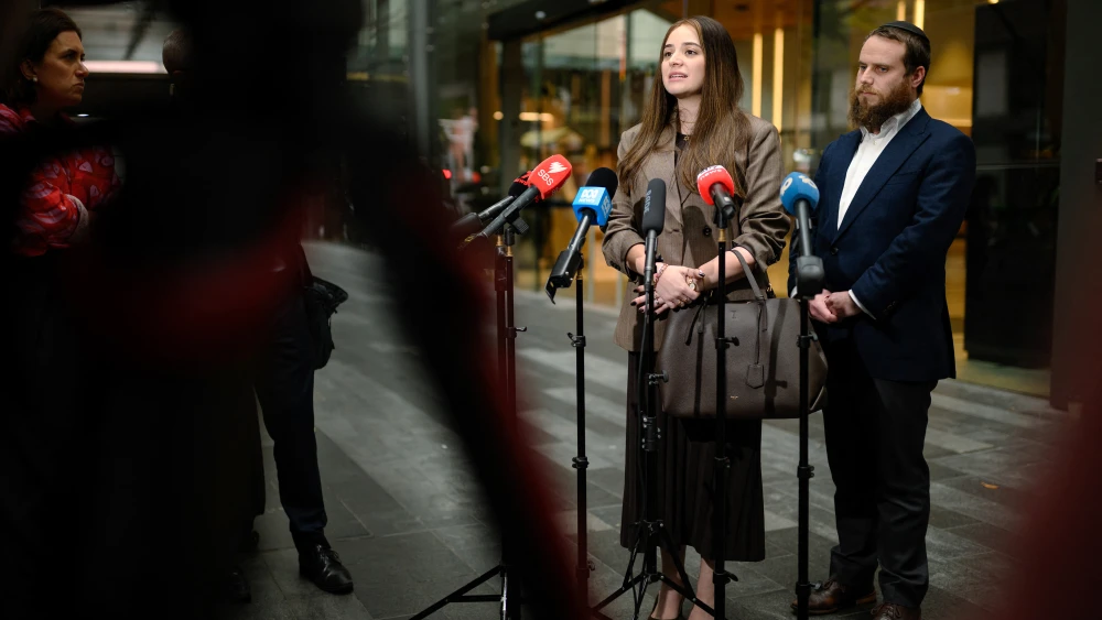 Sheina Gutnick, whose father was killed in a mass shooting at Bondi Beach, speaks to the media.