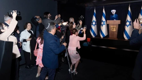 Visitors photograph the hologram of David Ben-Gurion, Israel's first prime minister, at the Friends of Zion Museum, Jan. 7, 2026. Credit: FOZ.