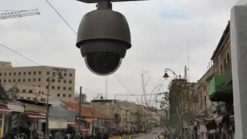 A camera hangs from a light rail stop on Jaffa Road in Jerusalem, Jan. 16, 2011. Photo by Nati Shohat/Flash90.