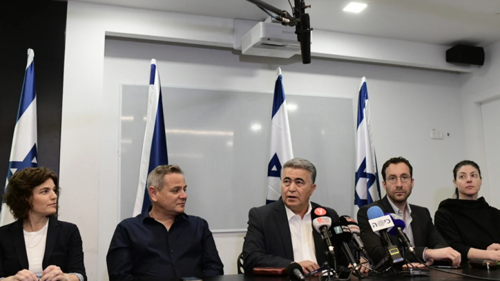 Labor Party chairman Amir Peretz (center), Meretz leader Nitzan Horowitz (second from left) and party members hold a press conference in Tel Aviv on March 12, 2020. Photo by Tomer Neuberg/Flash90.
