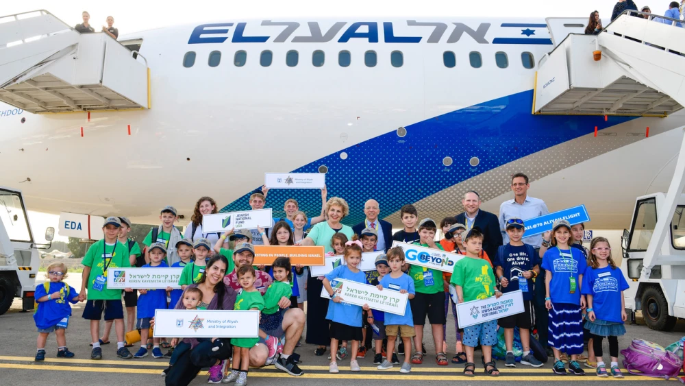 Children land at Ben-Gurion Airport and are greeted by Nefesh B'Nefesh co-founders Rabbi Yehoshua Fass and Tony Gelbart, as well as Israel's Minister of Aliyah and Integration, Sofa Landver. Credit: Photo by Shahar Azran.