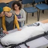 Miriam Ben Gal (center), wife of Rabbi Itamar Ben Gal, mourns near his body during his funeral in Har Bracha on Feb. 6, 2018. The rabbi was murdered when a Palestinian man stabbed him in a terror attack at the entrance to Ariel in the West Bank. Photo by Yonatan Sindel/Flash90