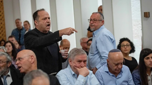 Itzik Buntzel, wearing black, speaks at a court hearing on petitions against the firing of Shin Bet director Ronen Bar at the Supreme Court in Jerusalem, April 8, 2025. Photo by Yonatan Sindel/Flash90.