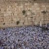 Jews pray at the Western Wall in Jerusalem's Old City on Jerusalem Day, May 29, 2022. Photo by Yonatan Sindel/Flash90.