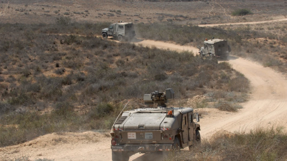Israeli armored vehicles patrol near the Israel-Gaza border, on Aug. 20, 2011. Photo by Gili Yaari/Flash 90.