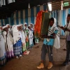 Members of Ethiopia's Jewish community carrying Torah Scrolls into synagogue. Credit: Struggle to Save Ethiopian Jewry.