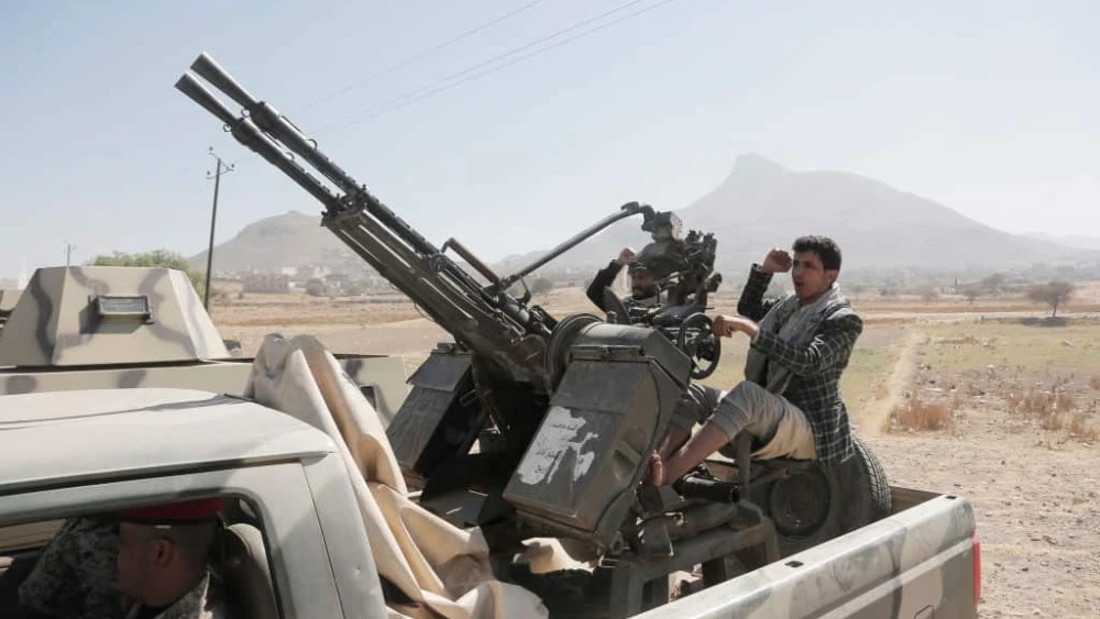 Houthi fighters during a tribal rally staged on the outskirts of Sanaa against Israeli and U.S. aerial attacks on Yemen, on Dec. 17, 2024. Photo by Mohammed Hamoud/Getty Images.