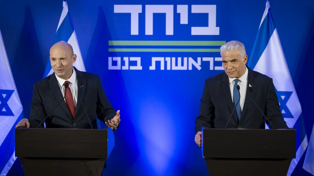 Former Prime Ministers Naftali Bennett (left) and Yair Lapid and hold a press conference in Herzliya announcing their joint list named “Together” ahead of upcoming elections, April 26, 2026. Photo by Chaim Goldberg/Flash90.