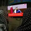 Palestinians watch a press conference of Qatar’s Prime Minister Sheikh Mohammed bin Abdulrahman bin Jassim Al Thani on the ceasefire deal between Israel and Hamas, in the West Bank city of Hebron, January 15, 2025. Photo by Wisam Hashlamoun/Flash90