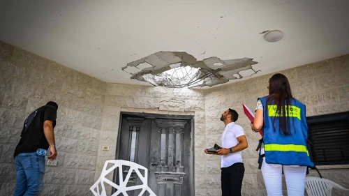 People at the site of a damaged house following a missile attack from Lebanon, in Moshav Manot, northern Israel, Aug. 25, 2024. Photo by Flash90.