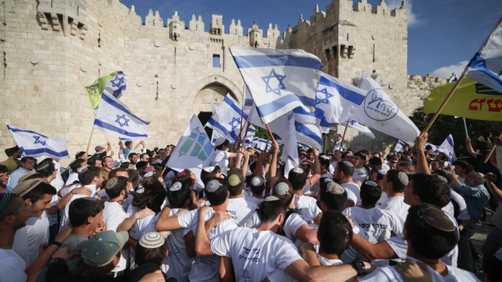 Jews dance outside the Damascus Gate to the Old City during Jerusalem Day celebrations, May 18, 2023. Photo by Yonatan Sindel/Flash90.