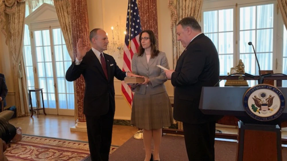 U.S. Special Envoy for Monitoring and Combating Anti-Semitism Elan Carr is sworn in (on a Hebrew Bible, or Tanach) by U.S. Secretary of State Mike Pompeo on April 11, 2019. Credit: Josh Katzen/JNS.