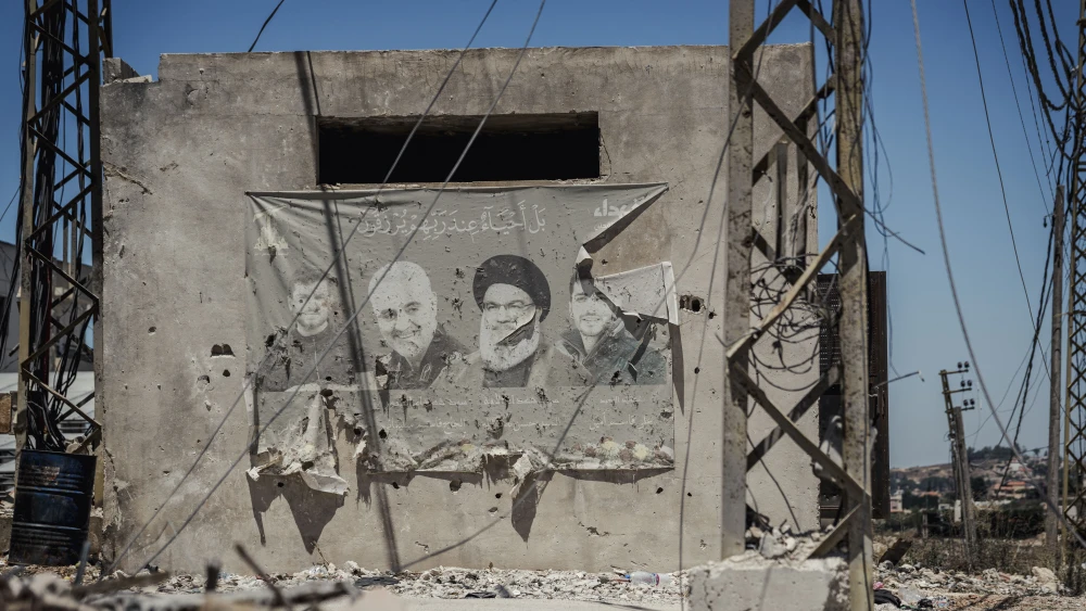 A war-damaged building bearing a mural featuring slain Hezbollah leader Hassan Nasrallah and other Iranian terrorists in Maifadoun, Southern Lebanon, July 31, 2026. Photo by Silvia Casadei/Middle East Images/AFP via Getty Images.