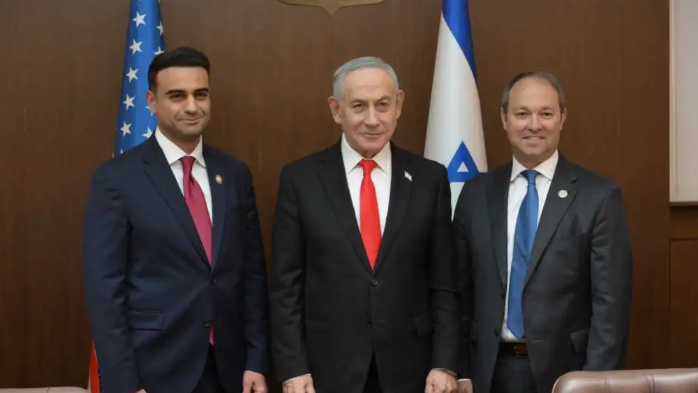 Israeli Prime Minister Benjamin Netanyahu, center, poses with U.S. Reps. Abraham Hamadeh, R-Ariz., left, and Marlin Stutzman, R-Ind., during a meeting at the Prime Minister's Office in Jerusalem, May 27, 2026. Photo by Amos Ben-Gershom/GPO.