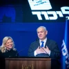 Israeli Prime Minister Benjamin Netanyahu and his wife, Sara, address supporters on the night of the Israeli elections at Likud Party headquarters in Tel Aviv, March 2, 2020. Photo by Olivier Fitoussi/Flash90.