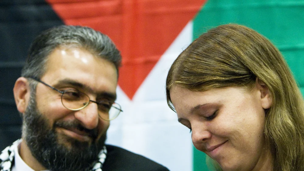 Anti-Israel activists Amin Abou Rashed and Anne De Jong give a press conference in The Hague, the Netherlands, on June 4, 2010. Photo by Valerie Kuypers/ANP/AFP via Getty Images.