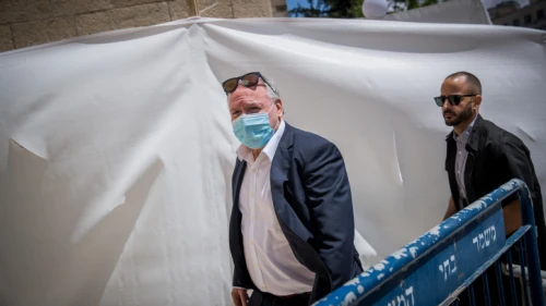 Cyber and National Digital Matters Minister David Amsalem arrives at the District Court in Jerusalem, ahead of the start of Israeli Prime Minister Benjamin Netanyahu's trial on criminal allegations of bribery, fraud and breach of trust. May 24, 2020. Photo by Yonatan Sindel/Flash90.