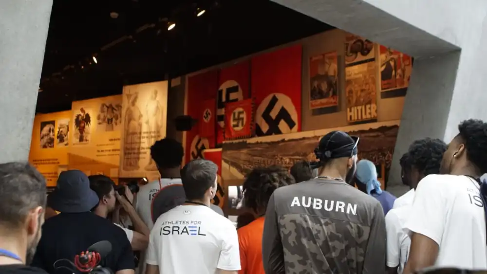 Members of the Auburn Tigers basketball team tour Yad Vashem, the World Holocaust Remembrance Center in Jerusalem, as part of a trip to Israel to play ball, Aug. 3, 2022. Credit: Yad Vashem.