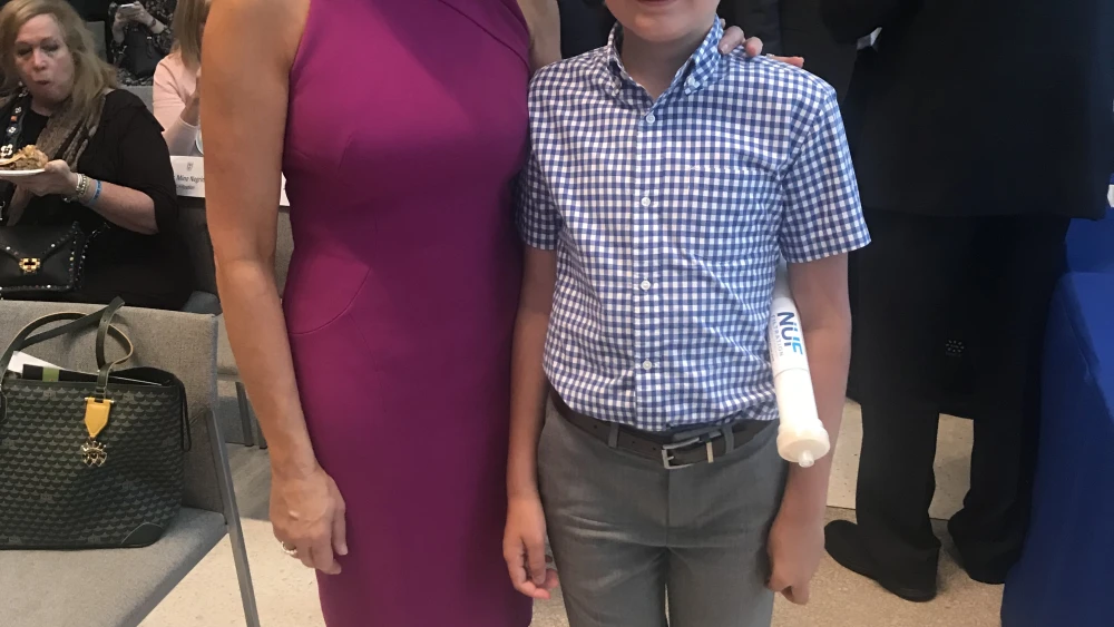 Melissa Francis and her son, Thompson, at the UN headquarters at an event celebrating Israeli innovation. Credit: Shiryn Ghermezian.