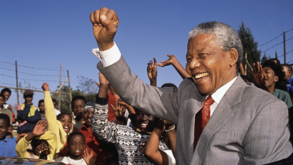 Nelson Mandela visits Hlengiwe School in Johannesburg, South Africa, in an undated image. Photo by Louise Gubb/Corbis Saba/Getty Images.