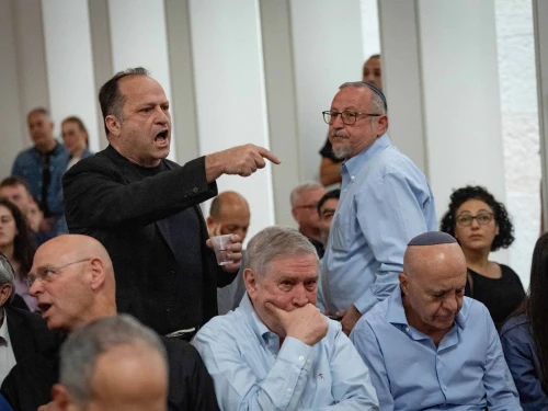 Itzik Buntzel, wearing black, speaks at a court hearing on petitions against the firing of Shin Bet director Ronen Bar at the Supreme Court in Jerusalem, April 8, 2025. Photo by Yonatan Sindel/Flash90.