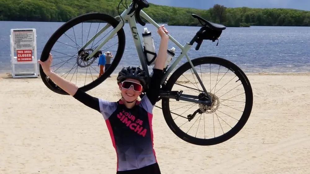 Cancer survivor Pessy Zeiger, 19 of Monsey, N.Y., plans to bike the 65- to 70-mile route starting and ending off at Camp Simcha. Photo by Lenny Groysman.