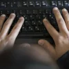 Typing on a Hebrew keyboard. Credit: Flash90.