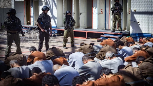 Israel Prison Service personnel guard terrorists caught during the Oct. 7 massacre and IDF operations in the Gaza Strip, at a prison in southern Israel, Feb. 14, 2024. Photo by Chaim Goldberg/Flash90.