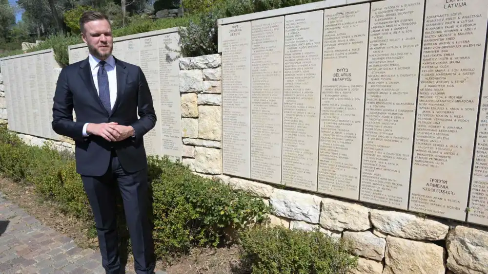 Lithuanian Foreign Minister Gabrielius Landsbergis visits the Garden of the Righteous at Yad Vashem in Jerusalem, March 2, 2023. Courtesy of the Lithuanian Embassy.