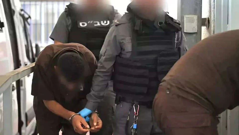 Israel Prison Service guards transport Hamas terrorists who perpetrated atrocities on Oct. 7. Credit: Israel Prison Service.