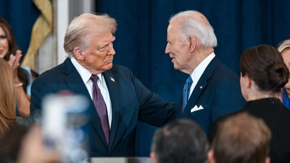 U.S. President-elect Donald Trump and U.S. President Joe Biden at Trump's inauguration in the U.S. Capitol Rotunda in Washington on Jan. 20, 2025. Photo by Kenny Holston-Pool/Getty Images.