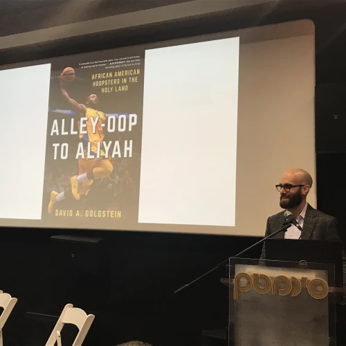 Author David Goldstein speaks about his book at a Nefesh B'Nefesh event in Jerusalem. Credit: Eliana Rudee.