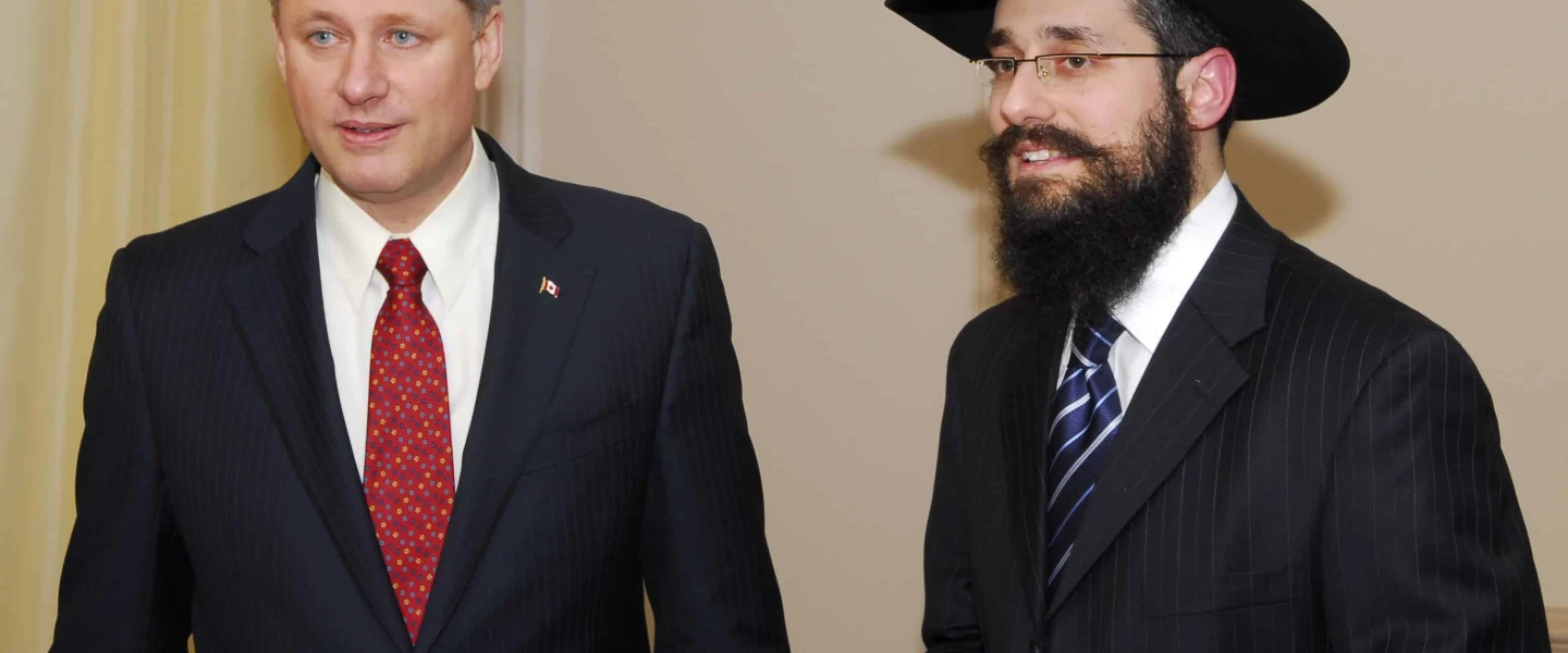Rabbi Mendel Kaplan of Chabad Flamingo with former Canadian Prime Minister Stephen Harper in 2009. Credit: Courtesy.