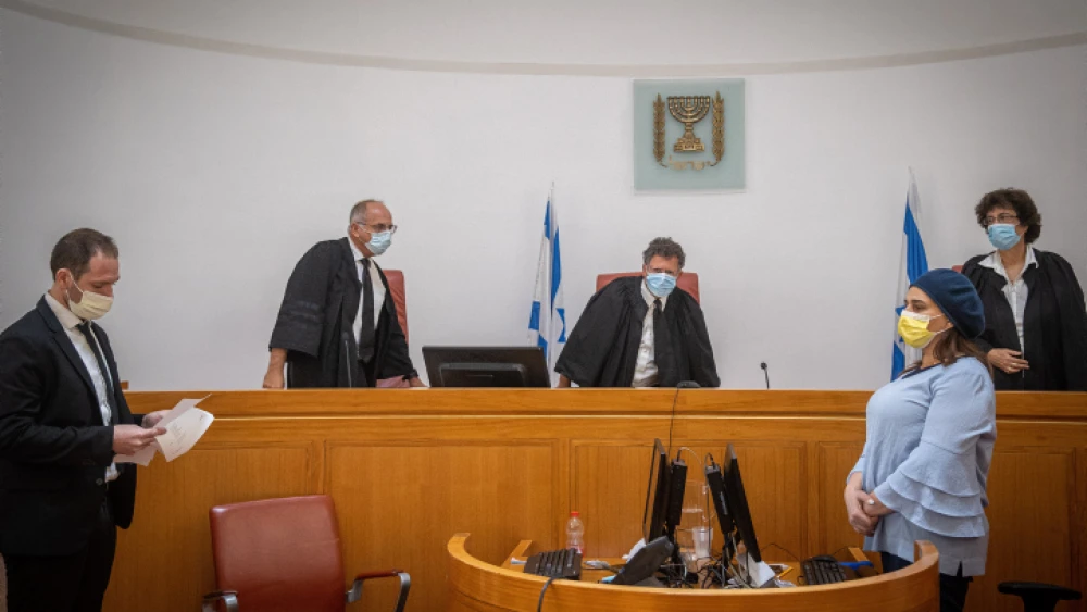 Israeli Supreme Court justice Yitzhak Amit (center) attends a hearing regarding the evacuation of Arab families from their home in Jerusalem's Sheikh Jarrah neighborhood, on Aug. 2, 2021. Photo by Yonatan Sindel/Flash90.