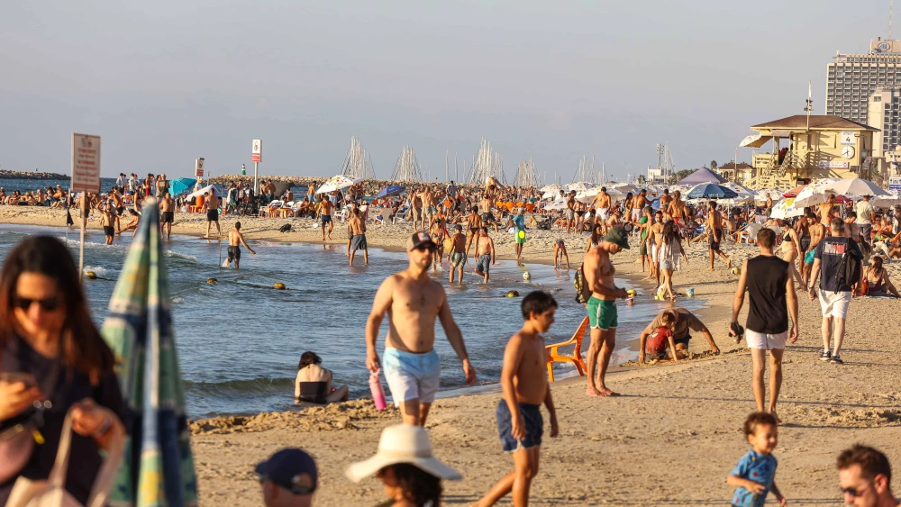 Israelis enjoy the beach in Tel Aviv on Sept. 28, 2024. Photo by Itai Ron/Flash90.