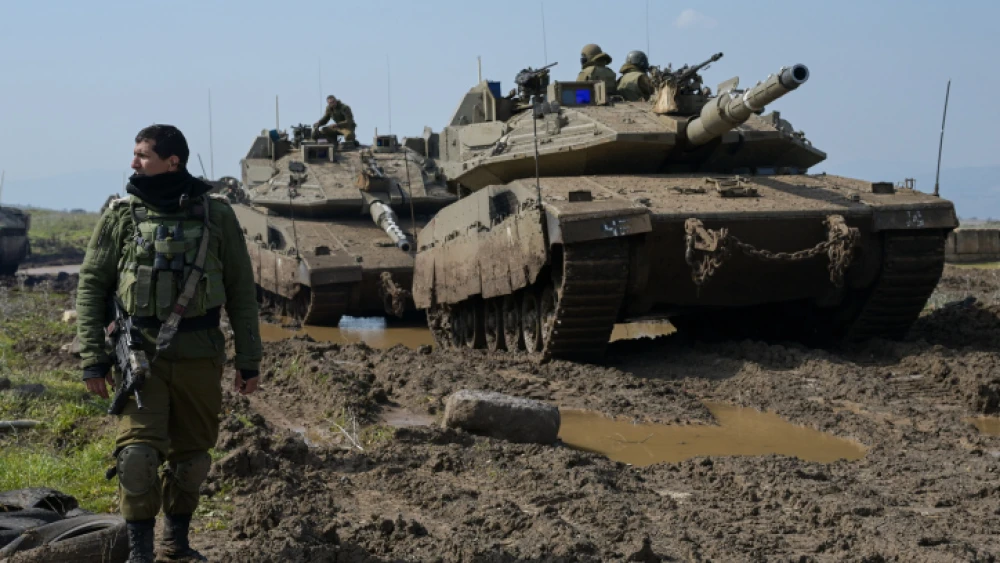 IDF Armored Corps soldiers drill near Moshav Aniam on the Golan Heights, Feb. 14, 2023. Photo by Michael Giladi/Flash90.