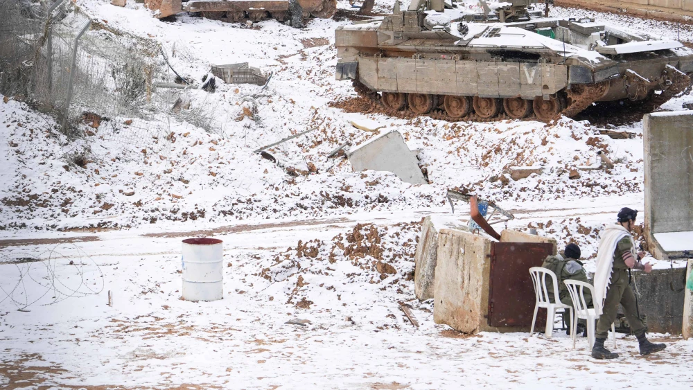 Israeli soldiers seen in the snow on the Israeli border with Lebanon, on Feb. 24, 2025. Photo by Ayal Margolin/Flash90.