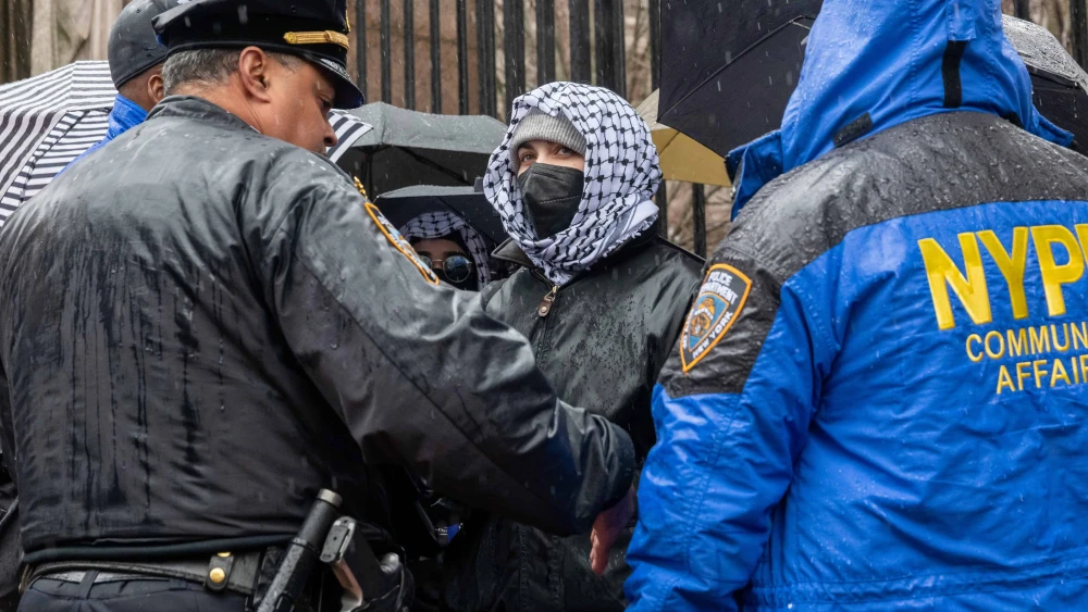 Police interact with demonstrators as they rally in support of Palestine and to protest the arrest and detention of Mahmoud Khalil, a green card holder who played a role in pro-Palestinian protests, outside of Columbia University in New York City on March 24, 2025. Photo by Spencer Platt/Getty Images.