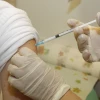 A patient receiving a vaccine. Photo: Miriam Alster/Flash90.