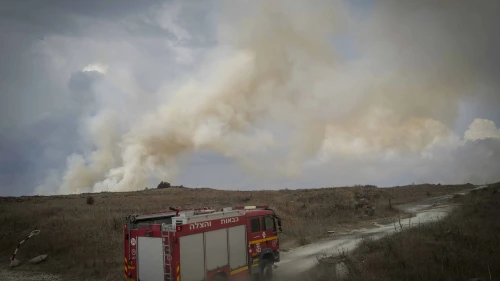Firefighters combat wildfires following a 25-missile barrage on the northern town of Katzrin and central Golan Heights, Nov. 3, 2024. Photo by Michael Giladi/ Flash90.
