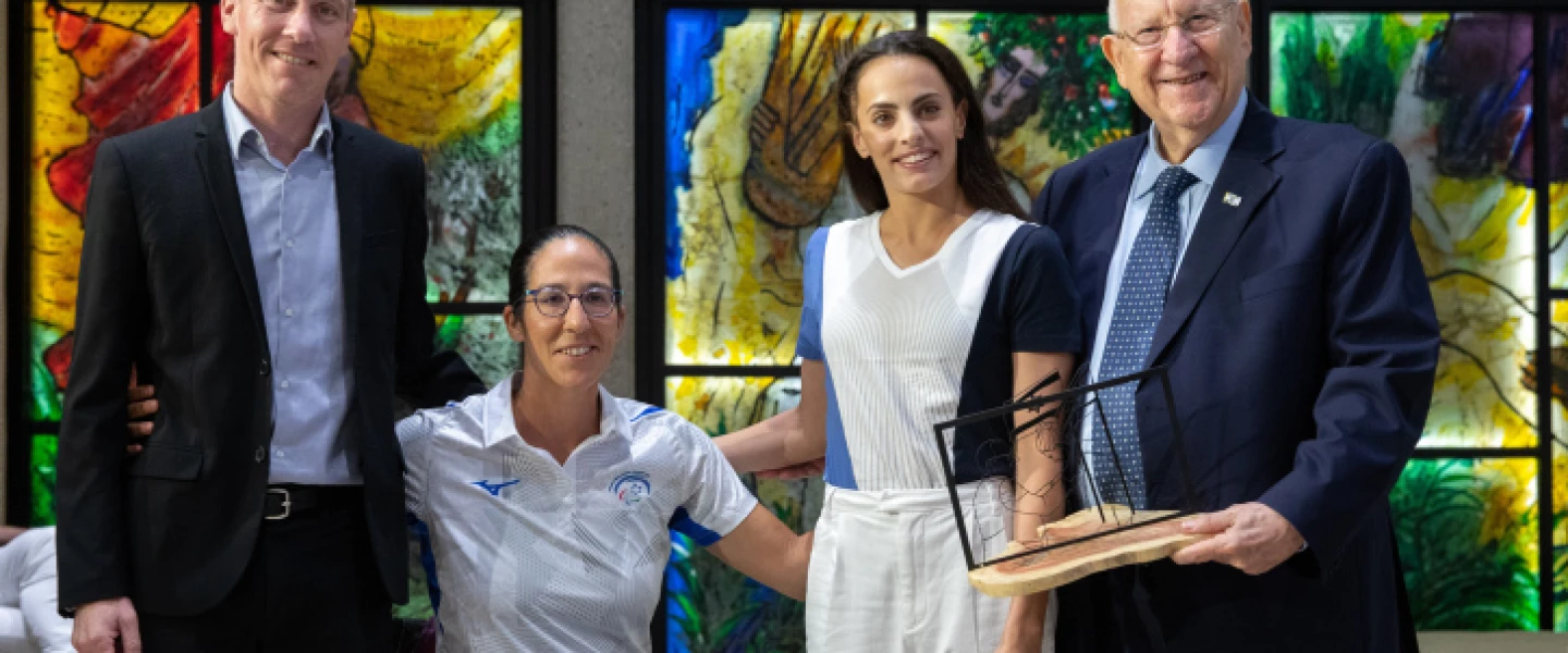 From left: Israeli Culture and Sports Minister Yehiel "Hili" Tropper, Paralympic rower Moran Samuel, gymnast Linoy Ashram and Israeli President Reuven Rivlin, at the President's Residence in Jerusalem, June 23, 2021. Photo by Olivier Fitoussi/Flash90.