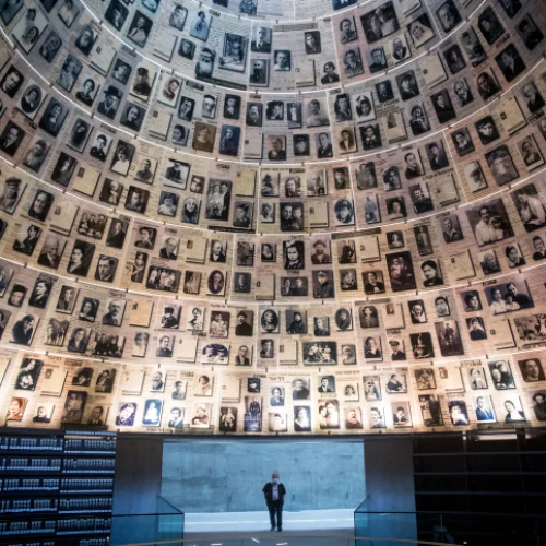 A security guard stands in the empty Hall of Names at the Yad Vashem Holocaust Memorial Museum in Jerusalem on April 19, 2020. Photo by Yonatan Sindel/Flash90.